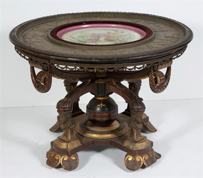 Lot 312 - Renaissance Revival Carved and Parcel Gilt Rosewood and Repousse Copper Center Table