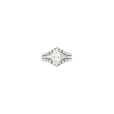 Lot 131 - Platinum and Diamond Ring with White Gold and Diamond Ring Jacket