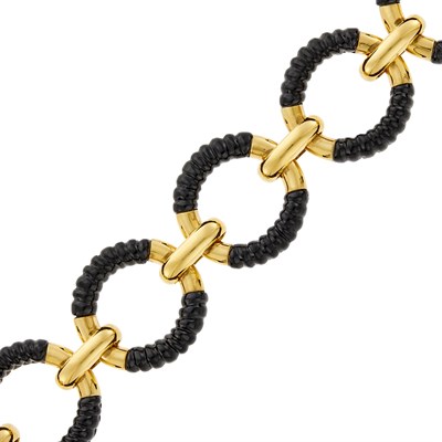 Lot 176 - Gold and Carved Black Onyx Circle Link Bracelet, France
