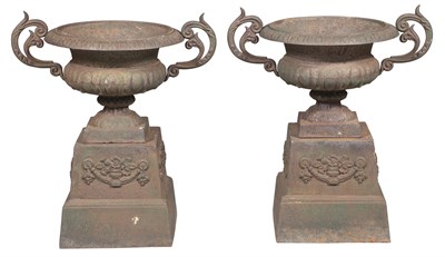 Lot 334 - Pair of Cast Metal Urns Height 28 1/2 inches.