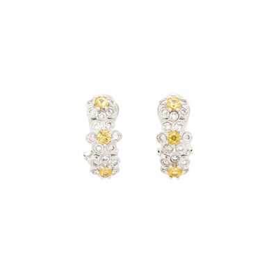 Lot 1052 - Pair of White Gold, Yellow Sapphire and Diamond Flower Earrings