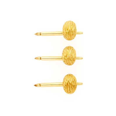 Lot 2139 - Van Cleef & Arpels Three Gold Walnut Studs