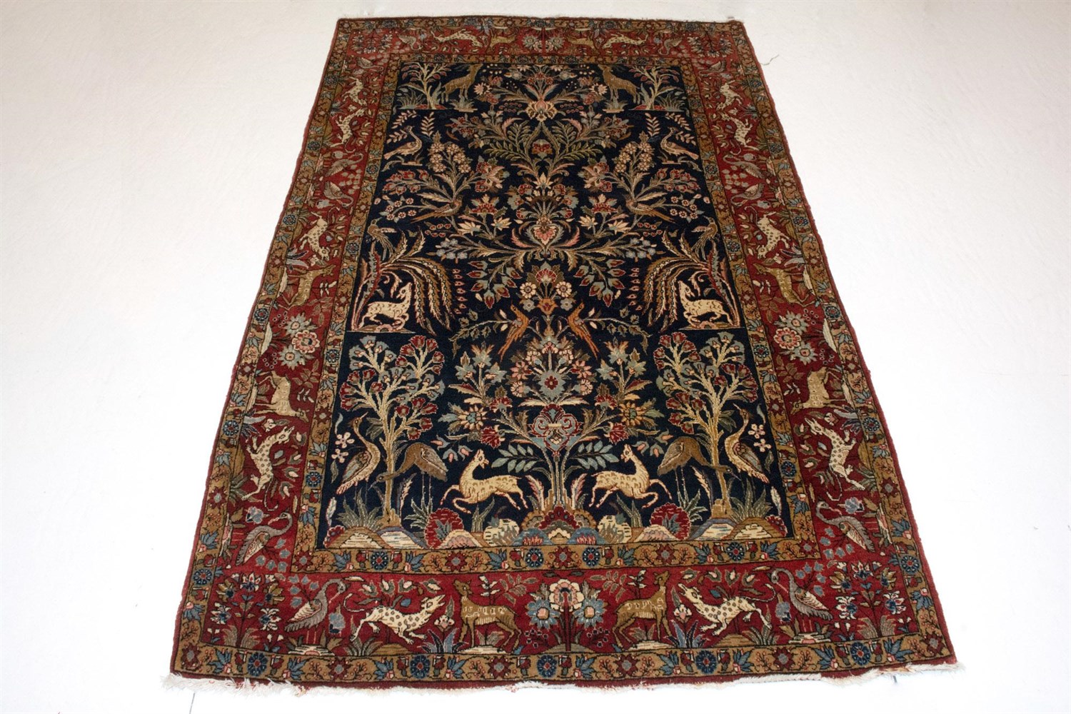 Lot 394 - Qum Wool Rug Central Iran, second half of the...