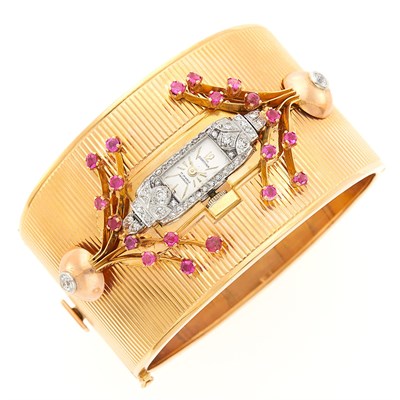 Lot 2142 - Rose Gold, Platinum, Ruby and Diamond Cuff Bracelet-Watch