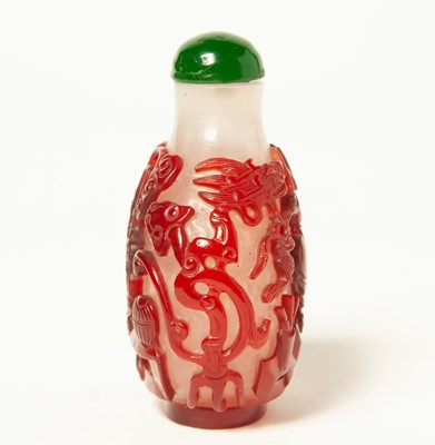 Lot 14 - A Red Glass Overlay Chinese Snuff Bottle