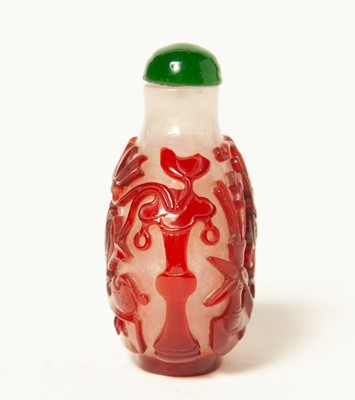 Lot 14 - A Red Glass Overlay Chinese Snuff Bottle