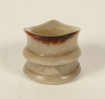 Lot 24 - A Chinese Jade Thumb Ring