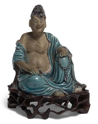 Lot 208 - An Unusual Chinese Fahua Glazed Pottery Buddhist Figure