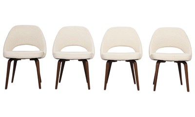 Lot 79 - Set of Four Eero Saarinen Walnut and...