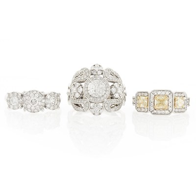 Lot 1077 - Three White Gold, Colored Diamond and Diamond Rings