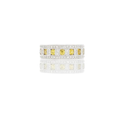 Lot 1042 - White Gold, Yellow Sapphire and Diamond Band Ring