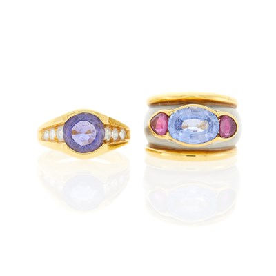 Lot 1012 - Wide Two-Color Gold, Sapphire and Ruby Ring and Gold, Tanzanite and Diamond Ring