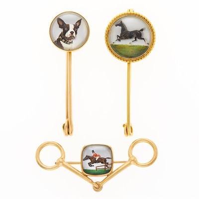 Lot 2275 - Three Gold, Reverse Rock Crystal Intaglio and Mother-of-Pearl Brooches