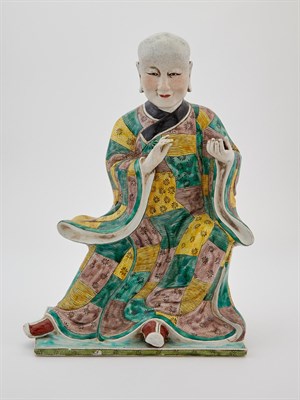 Lot 312 - A Chinese Sancai Decorated Bisque Porcelain Figure of a Luohan