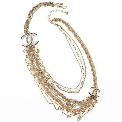 Lot 2089 - Chanel Two Multistrand Gilt-Metal, Imitation Pearl and Rhinestone Necklaces, France