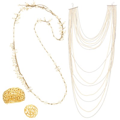 Lot 2097 - Chanel Long Gilt-Metal and Imitation Pearl Necklace, Fourteen Strand Necklace, Cuff Bracelet and Brooch, France