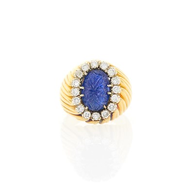 Lot 18 - Gold, Carved Sapphire and Diamond Ring