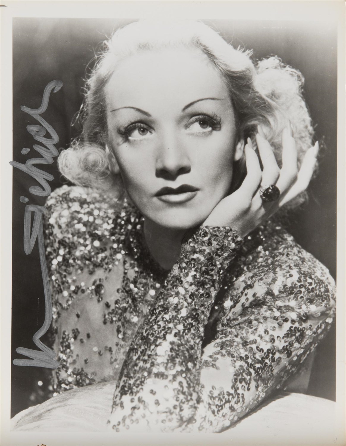 Lot 99 - DIETRICH, MARLENE Signed photograph depicting...