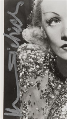 Lot 99 - DIETRICH, MARLENE Signed photograph depicting...