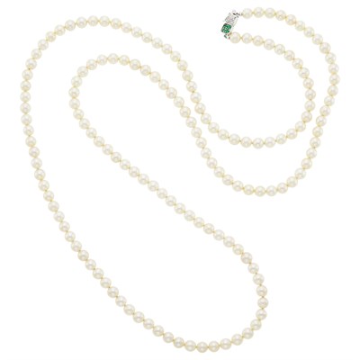 Lot 1163 - Long Cultured Pearl Necklace with White Gold and Emerald Clasp