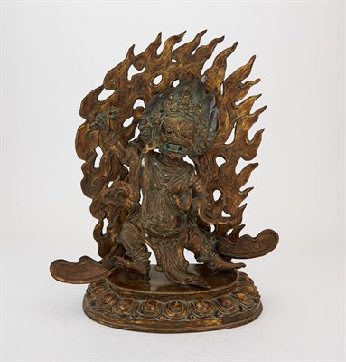 Lot 349 - A Large Tibetan Parcel-Gilt Bronze Figure of Mahakala