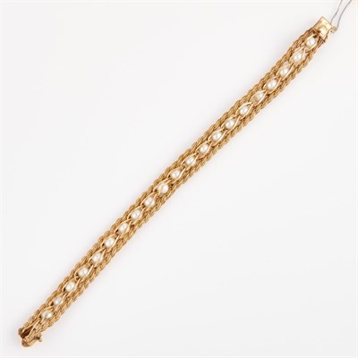 Lot 265 - Gold and Bead Flexible Bracelet, 14K 14 dwt. all