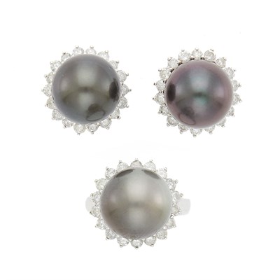 Lot 1125 - Pair of White Gold, Gray Tahitian Cultured Pearl and Diamond Earclips and Ring