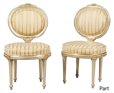 Lot 165 - Set of Four Louis XVI Style Painted and Parcel-Gilt Side Chairs