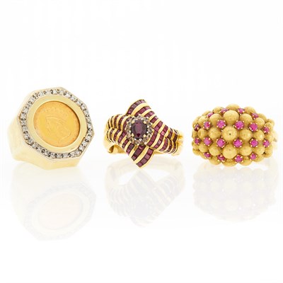 Lot 2264 - Three Two-Color Gold, Ruby, Diamond and Coin Rings