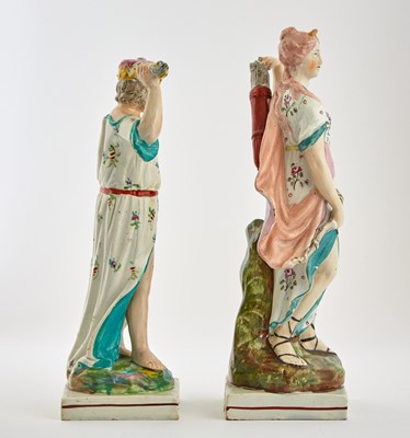 Lot 128 - Two Staffordshire Pottery Figures