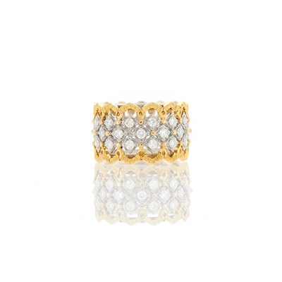 Lot 1040 - Wide Two-Color Gold and Diamond Band Ring