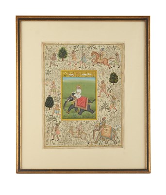 Lot 124 - An Indian Gouache Painted Miniature Depicting an Elephant and Rider