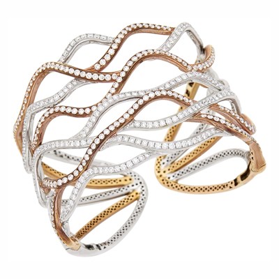 Lot 70 - Two-Color Gold and Diamond Cuff Bangle Bracelet