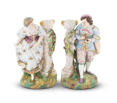 Lot 230 - Pair of Bisque Porcelain Figural Candlesticks