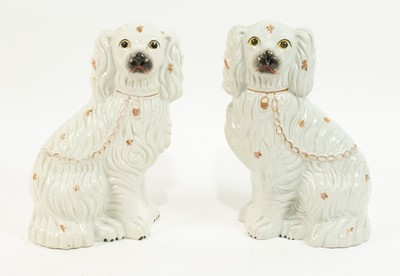 Pair of Staffordshire Pottery Dogs
