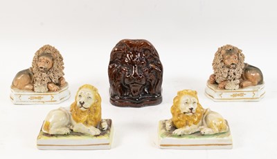 Lot 235 - Group of Staffordshire Style Recumbent Lions