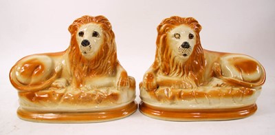 Lot 223 - Pair of Staffordshire Recumbent Lions