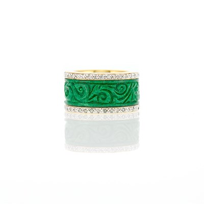 Lot 1034 - Two-Color Gold, Carved Jade and Diamond Band Ring