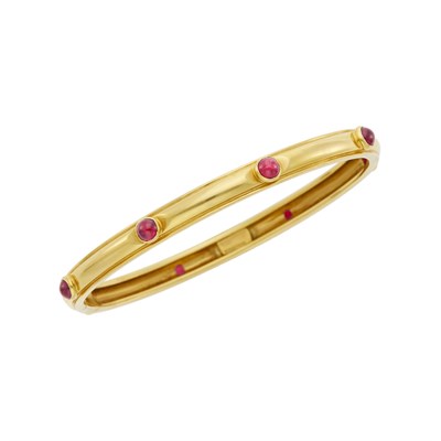 Lot 40 - Tiffany & Co. Gold and Cabochon Ruby Bangle Bracelet