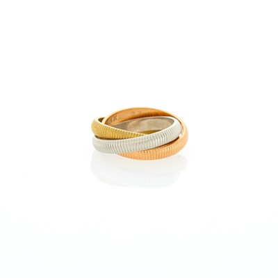 Lot 1048 - Cartier Tricolor Gold 'Trinity' Rolling Band Ring