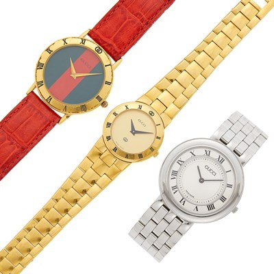 Lot 2231 - Three Gucci Gilt-Steel Wristwatches