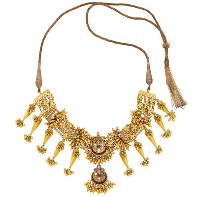 Lot 2100 - Indian Gold and Foil-Backed Gem-Set Necklace with Cord