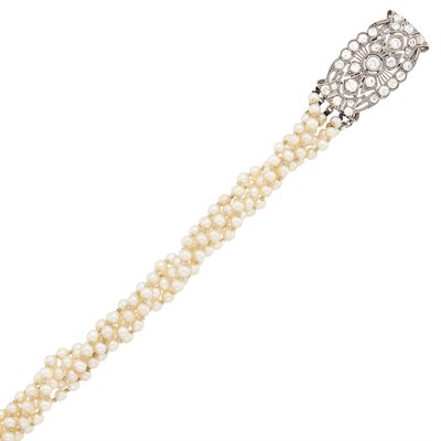 Lot 2086 - Five Strand Pearl Torsade Bracelet with Platinum and Diamond Clasp