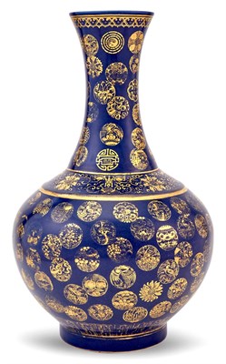 Lot 324 - A Chinese Gilt Decorated Powder Blue Porcelain Bottle Vase