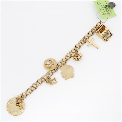 Lot 57 - Gold Charm Bracelet with 7 gold, stone and...