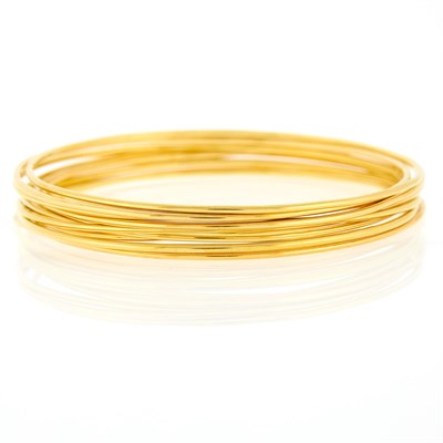 Lot 1071 - Ten Gold Bangle Bracelets