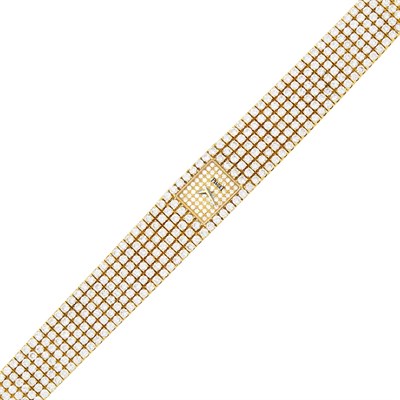 Lot 200 - Piaget Gold and Diamond 'Fully Loaded' Dress Wristwatch