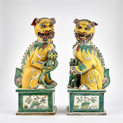 Lot 71 - A Pair of Chinese Famille Verte Porcelain Fu Lions