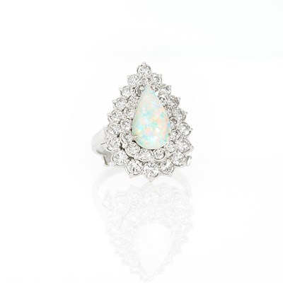 Lot 1093 - Platinum, White Opal and Diammond Ring