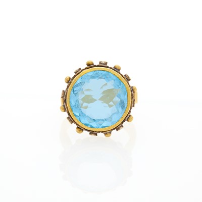 Lot 1148 - Gold, Silver, Blue Topaz and Diamond Ring